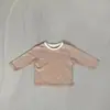 INS primavera y otoño infantil cómodo todo-partido jersey ligero tabla retro hombres y mujeres Color de bebé a juego camiseta de manga larga