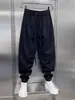 Nuevos pantalones deportivos casuales de otoño e invierno para hombre, de corte holgado, modernos, elegantes, sencillos, versátiles y adecuados para estudiantes, con un diseño de pierna cónica