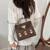 Bolsa feminina estilo luxo, novo modelo outono 2026, bolsa pequena tipo casa color block, bolsa de ombro e transversal moderna e única