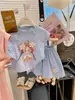 2026 Novo Estilo de Verão Camiseta Fofa de Desenho Animado de Manga Curta para Meninas Conjunto de Shorts Finos Estilo Pequeno Cheiroso para Crianças