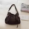 Bolso de hombro a cuadros retro estilo coreano, nueva moda 2026, con detalle de lazo, ofreciendo un look relajado y casual, adecuado para uso en exteriores