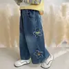 Jeans Rasgado de Retalhos Estilo Coreano para Meninas Primavera e Outono Estilo 2026 Nova Moda Infantil Calças Longas Estilosas para Menininha Tendência