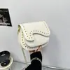 Yuezi 2026 Verão Nova Bolsa Sela Retrô com Rebites e Franjas Mini Carteira de Moedas Batom Fone de Ouvido Bolsa Transversal Pequena