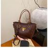 Bolso de Mano de Moda Simple 2025 Principios de Primavera Nuevo Bolso Balde Texturizado Retro Moderno Color Sólido Trendy para Viajero Bolso Bandolera de Hombro