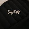 Pendientes de lazo de diamantes estilo coreano con aguja de plata, elegantes pendientes de moda que combinan con todo, pendientes de diseño de nicho, lujo ligero, sentido de alta gama