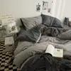 Conjunto de cama xadrez minimalista estilo japonês INS de quatro peças, capa de edredom, lençol, conjunto de três peças para dormitório