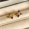 Set de pendientes, collar y anillo de plata chapada en oro real con circonita cúbica, piedra ojo de tigre y forma de flor de diamante - una lujosa y vintage colección de joyería para mujer