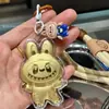 Llavero de Oro Puro Peluche Colgante Dorado Adorno para Teléfono Regalo de Moda Fábrica Mayorista Fabricante de Primera Mano Artículo Popular