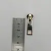 Nº 5 dourado claro metal fundo puxador bolsa zíper de roupa puxador fabricantes em estoque atacado
