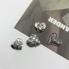 Nuevos Accesorios de Corazón Cruzado Joyería Personalizada Estilo Oscuro Parche de Aleación Hecho a Mano Accesorios para el Cabello Flores para Zapatos Materiales DIY