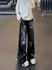 Jeans Estampados con Graffiti para Hombre Pierna Ancha Diseño Holgado Pantalones de Nicho Calle Alta Americana Hip-Hop Pantalones de Pierna Ancha