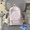 Nova Mochila Pequena Versátil de Cor Sólida Feminina Estilo Coreano Menina Estudante Mini Mochila Alto Valor Simples Casual