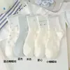 Calcetines Azules Claros con Moño al por Mayor Personalizados para Mujer Primavera Verano Calcetines de Media Pantorrilla Estilo Coreano Ins Estilo Academia Calcetines Deportivos Cortos Zhuji