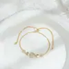 Joia de Mão Elegante com Zircônia Micro-Incustada Banhada a Ouro Real para Mulheres, Pulseira Ajustável de Puxar Coração Cheia de Diamantes de Alto Padrão Atacado