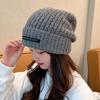 Gorro de lana negro suelto para mujer, de otoño e invierno, para el frío, moderno, de punto cálido y combinable.
