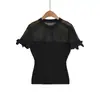 Nuevo top de punto para mujer, estilo maduro, cuello redondo, hueco, lazo, manga corta, puro y seductor, semitransparente, sexy, chica caliente