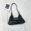Bolso de mujer 2026 primavera nuevo modelo bolso de axila para ir al trabajo, moderno, simple, diseño de nicho, bolso de hombro