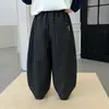 Calças de menino para o outono de 2026, novas calças de moletom xadrez estilosas para crianças, calças compridas casuais estilo jogger de perna larga para meninos, modernas e descoladas