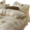Juego de ropa de cama de cuatro piezas de algodón 100% de alto recuento con bordado floral color crema, sábana de algodón puro engrosada, funda de edredón, ropa de cama