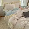 Juego de cuatro piezas estilo princesa francesa de terciopelo de leche Clase A, juego de tres piezas de terciopelo para bebé engrosado con encaje coreano fresco y fresco