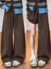 Calça marrom Maillard cor de café Outono 2026 Novo Estilo Caimento Solto Casual Perna Larga Calça de Moletom Esportiva Cimitarra