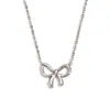 Pendientes de Moda INS Europeos y Americanos, Nicho Simple, Lindos, Acero Inoxidable Chapado en Oro de 18 Quilates, Collar con Colgante de Lazo Dulce para Mujer