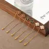 Nuevos Pendientes Coreanos de Nicho Combinación de Cuatro Corazones Trébol de Cuatro Hojas Estilo Ins Moda Elegantes Versátiles Pendientes de Acero de Titanio