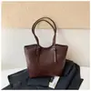 Bolsa de ombro minimalista e casual estilo coreano para mulheres, nova coleção 2026, apresentando uma textura de alta qualidade, um design único e grande capacidade