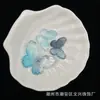 Gelo através de borboleta bicolor perfurada artesanal DIY acessórios de joias acessórios rede vermelha treme ao vivo fornecimento em estoque atacado