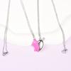 Venta al por mayor de fábrica collar magnético de tiro con arco perfora-corazones cadena de acero inoxidable electrochapado multicolor par de pareja