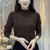 Elegante blusa de encaje patchwork cálida de nuevo estilo para otoño e invierno para mujer, top de manga larga de malla suelta de cuello semi-alto