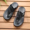 Superventas de Amazon Chanclas Transfronterizas para Hombre Tira entre los Dedos Suela Suave Antideslizante Sandalias de Playa Chanclas de Moda Casual 1110
