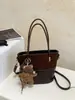 Bolso Pequeño Moda para Mujer Popular Bloque de Color Mate Cesta de Frutas Mini Bolso Cubo Nuevo Bolso de Hombro Cruzado de Alta Gama