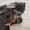 Bolsas de Alta Gama para Mujer 2026 Nuevo Estilo Bolso de Hombro para Viajar Bolso de Concha Moda Simple Diseño de Nicho Hombro Único Cruzado