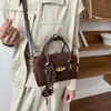 Bolsa de mão vintage transfronteiriça para mulheres, nova moda outono 2026 bolsa de ombro versátil, bolsa transversal tipo almofada para o dia a dia