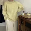 Nueva colección de otoño: Suéter de alta gama para mujer de piel de mapache en color rosa melocotón cremoso, con un diseño único y elegante con un ambiente relajado y casual para el invierno.