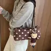 Bolso tipo baguette de alta gama mate estilo coreano para mujer, nuevo modelo otoño 2026, bolso de hombro con lunares texturizados, bolso de moda para el día a día