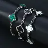 Pulsera Cruzada de Hip-Hop Europeo y Americano de Acero Inoxidable con Trébol de Cuatro Hojas para Mujer Cadena en Forma de O Joyería de Acero de Titanio Joyería de Diseño de Nicho Personalización de Joyería
