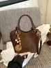 Bolso cruzado de nicho nuevo transfronterizo 2026, simple y elegante, bolso de mano vintage de moda, bolso casual de moda para mujer