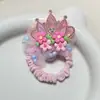 Accesorios para el cabello de corona para niños primavera y verano banda de goma de flores cuerda para el cabello de niña pequeña banda de goma para bebé no daña el cabello al por mayor