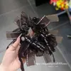 Goma para el pelo de encaje de malla brillante, modelo nuevo 2026 estilo coreano Dongdaemun, accesorio para el pelo de diseño nicho de lujo ligero para mujer