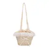 Bolso de paja de diseño único para mujer, gran capacidad, nuevo modelo 2026, lindo bolso de hombro, bolso tipo cubo de playa estilo vacación en la playa