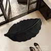 Alfombra absorbente antideslizante para baño del hogar, alfombra absorbente con drenaje de agua para encimera de cocina, alfombrilla de suelo simple de tierra de diatomeas con forma de hoja