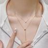 Collar elegante de estilo coreano con letra H, diseño apilado de doble capa, cadena de clavícula con cuentas redondas y borlas que combinan con todo.