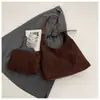 Bolsa feminina grande de camurça, moderna e versátil, nova 2026, bolsa de ombro casual vintage, bolsa tote para o dia a dia