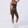 Camisola de yoga estilo europeo y americano con cuello halter de tacto desnudo, tipo dos piezas falsas, adelgazante y levantadora de glúteos, adecuada para deportes casuales y fitness
