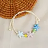 Jingdezhen Navidad Pulsera de Cuerda Trenzada de Cerámica Pulsera de Trébol de Cuatro Hojas Joyería Artística Hecha a Mano Venta al por Mayor Pulseras de Cerámica para Atracciones Turísticas