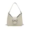 Bolso Pequeño Texturizado 2026 Nuevo Modelo Transfronterizo Bolso Cruzado Versátil para Mujer Bolso tipo Baguette de Un Solo Hombro para Debajo del Brazo Nicho Francés
