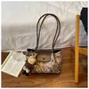 Bolsa de Gran Capacidad para Viajes Diarios Mujer 2025 Nuevo Otoño/Invierno Estampado de Leopardo Estudiante Universitario Bolso de Mano Tote Bolso Cruzado Hombro Único