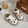 Nuevos Zapatos Primavera/Verano 2026 Cubierta de Dedo de Conejo Sandalias de Dibujos Animados Huecas para Niños Zapatos Pequeños de Cuero Zapatos de Princesa para Niñas